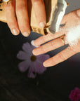 Plenished washing machine cleanser poured into hand